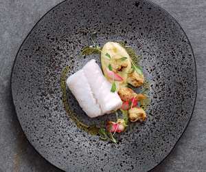 Michel Roux Jr's poached Skrei, cauliflower purée and pickled radishes