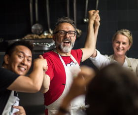 Massimo Bottura in the kitchen at the launch of one of his soup kitchens. Photograph by Simon John Owen