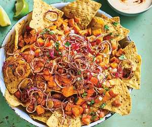 Vegan sweet potato nachos with crispy onions; photograph by Faith Mason