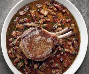 Matty Matheson's Double-Bone Pork Chop with Maple Jack Daniel’s Bacon Sauce; photograph by Quentin Bacon