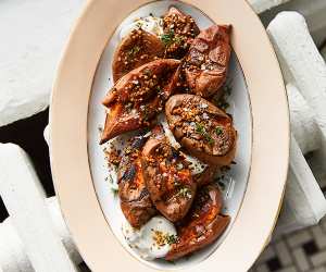 Alison Roman’s smashed sweet potatoes with maple syrup and sour cream; photography by Michael Graydon
