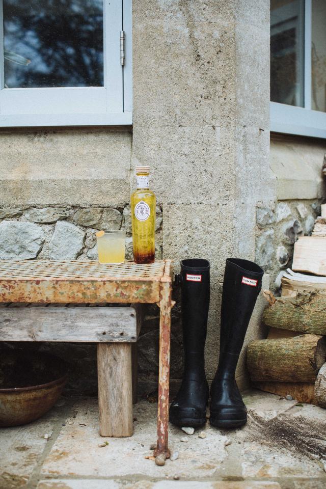 King's Ginger recipes: A bottle of King's Ginger next to some wellies