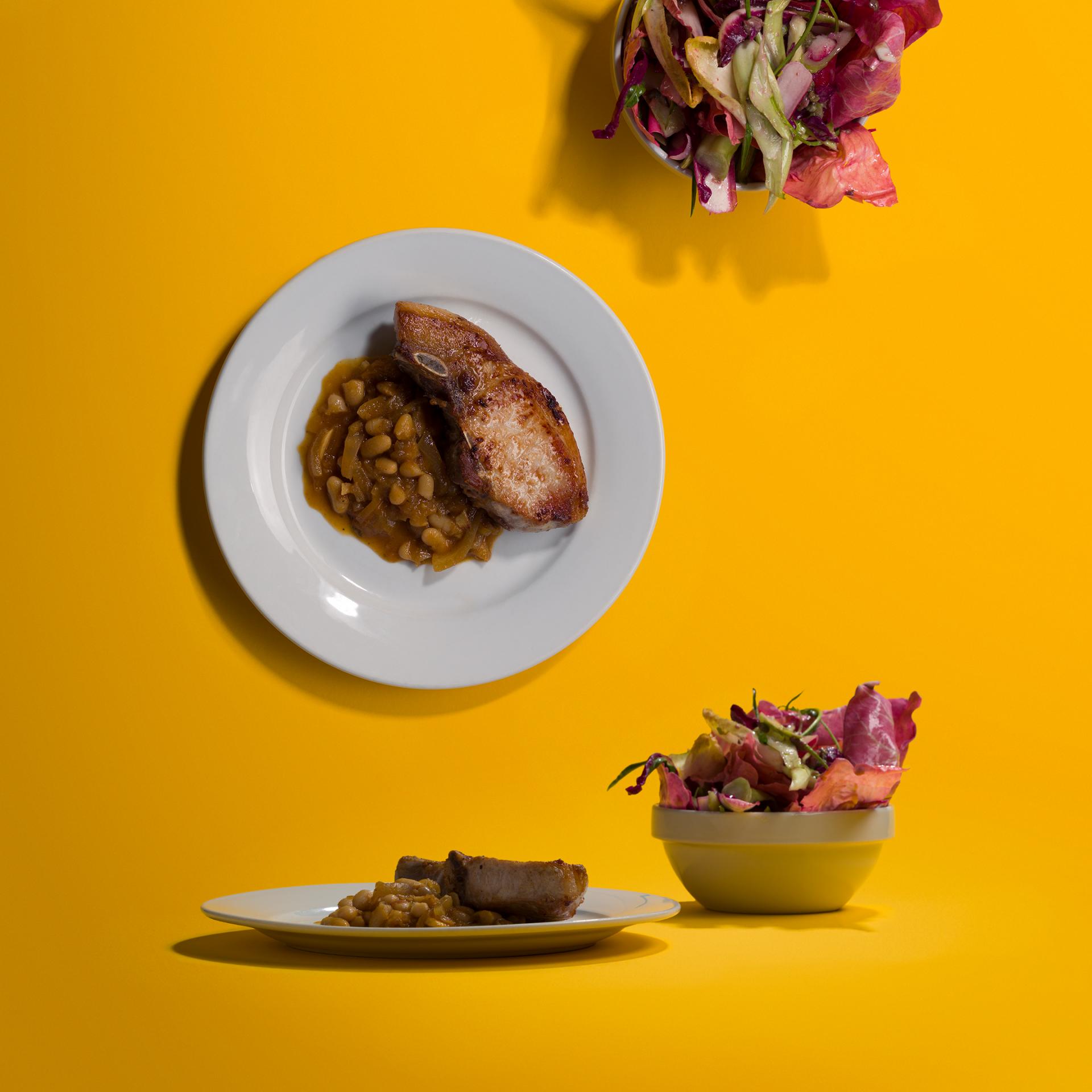 Margot Henderson's pork chop, beans and radichio salad Margot Henderson's pork chop, beans and radichio salad