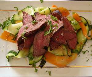 Venison steak with vegetable ribbons