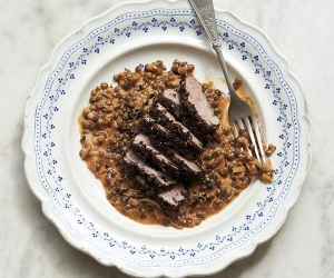 Emma Spitzer's seared duck with spiced lentils. Photography by Claire Winfield
