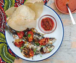 Sardine with kenkey at Zoe's Ghana Kitchen. Photograph by Camille Mack.