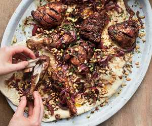 Yasmin Khan’s roast chicken with sumac and red onions; photography by Matt Russell