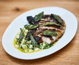 Orasay's Tamworth chop with white butter beans and spring greens