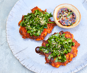 Make Meera Sodha’s kimchi pancakes with spinach salad; photography by David Loftus
