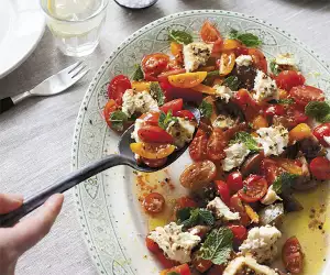 Anna Jones' traffic light tomatoes with oven-roasted feta