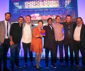 The team at Dandelyan accepting their award
