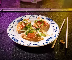 Freak Scene's Loch Duart salmon sashimi pizza with truffle ponzu, jalapeno and wasabi tobiko