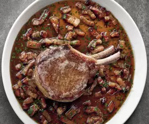 Matty Matheson's Double-Bone Pork Chop with Maple Jack Daniel’s Bacon Sauce; photograph by Quentin Bacon
