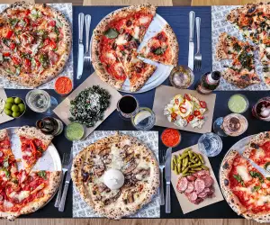 A spread of the pizzas on offer at Made of Dough, London