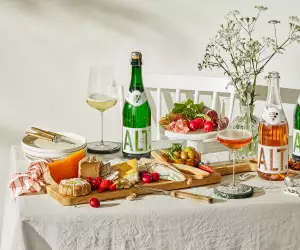 A table scene featuring Alt. Blanc de Blancs and Alt. Rose